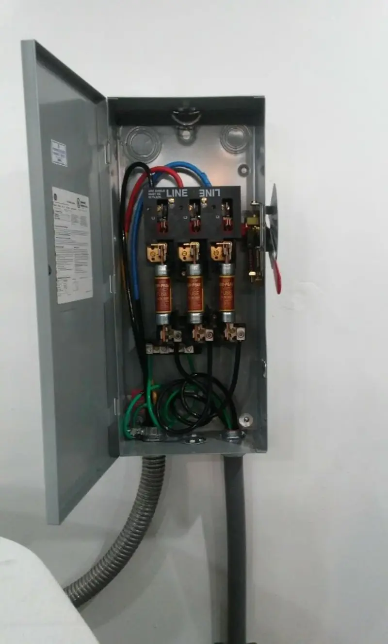 Three-phase disconnect switch installed for Smoke Detector Installation in Calumet